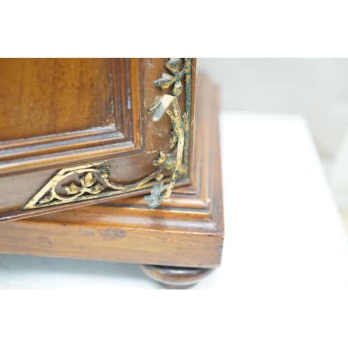 1422 - A late 19th century gilt metal mounted walnut games cabinet,with two panelled doors enclosing slidin... 