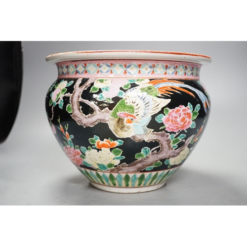 1424 - Three late 19th century Japanese porcelain dishes and a jardiniere, 19 cms high.