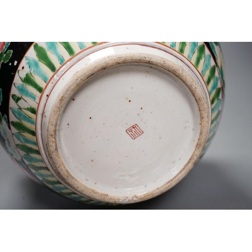 1424 - Three late 19th century Japanese porcelain dishes and a jardiniere, 19 cms high.