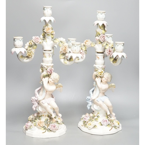 1425 - A pair of Sitzendorf  'cherub' candelabra 50cm