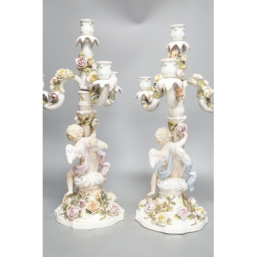 1425 - A pair of Sitzendorf  'cherub' candelabra 50cm