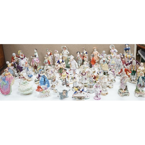 1561 - A large collection of small to medium German, French and English porcelain figurines and groups, tal... 