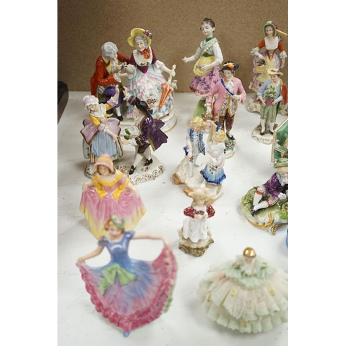 1561 - A large collection of small to medium German, French and English porcelain figurines and groups, tal... 