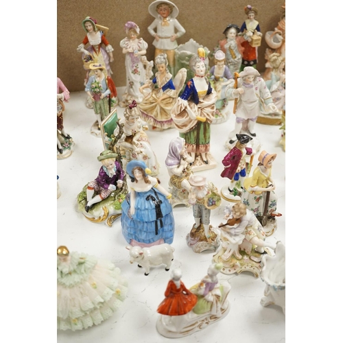 1561 - A large collection of small to medium German, French and English porcelain figurines and groups, tal... 