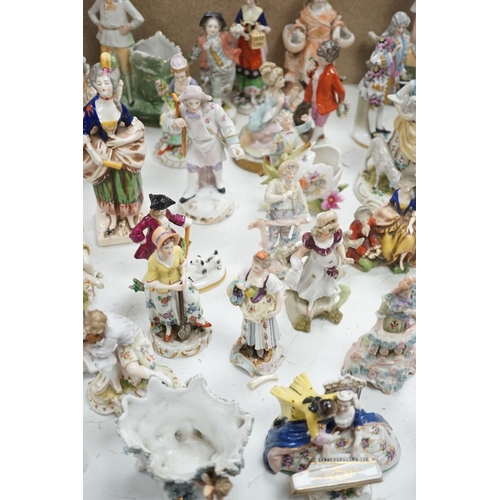 1561 - A large collection of small to medium German, French and English porcelain figurines and groups, tal... 