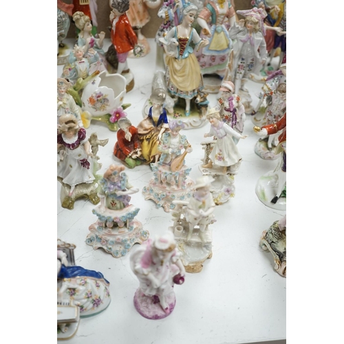 1561 - A large collection of small to medium German, French and English porcelain figurines and groups, tal... 