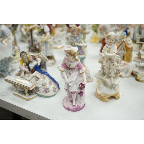 1561 - A large collection of small to medium German, French and English porcelain figurines and groups, tal... 
