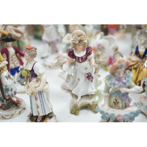 1561 - A large collection of small to medium German, French and English porcelain figurines and groups, tal... 