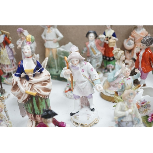1561 - A large collection of small to medium German, French and English porcelain figurines and groups, tal... 