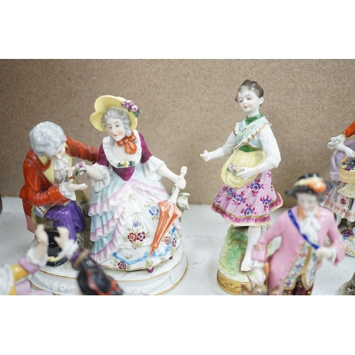 1561 - A large collection of small to medium German, French and English porcelain figurines and groups, tal... 