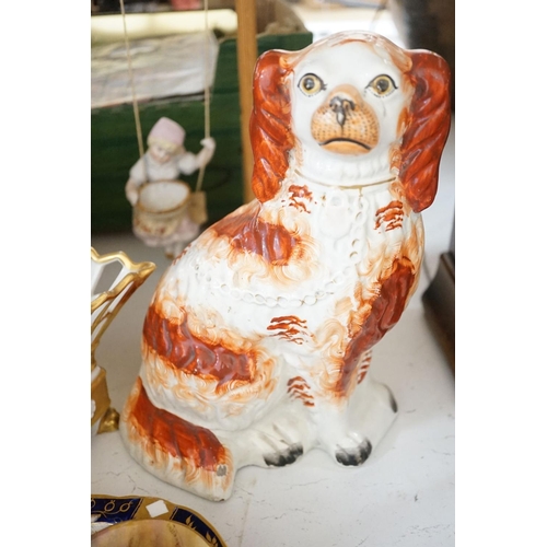 1569 - A pair of bisque swinging figures, Royal Worcester cabinet cup and saucer and five other items... 