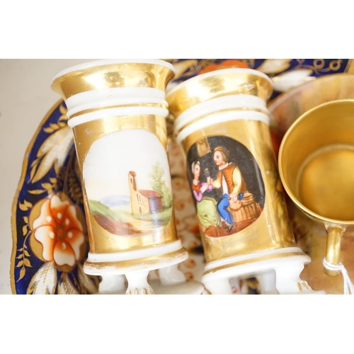 1569 - A pair of bisque swinging figures, Royal Worcester cabinet cup and saucer and five other items... 