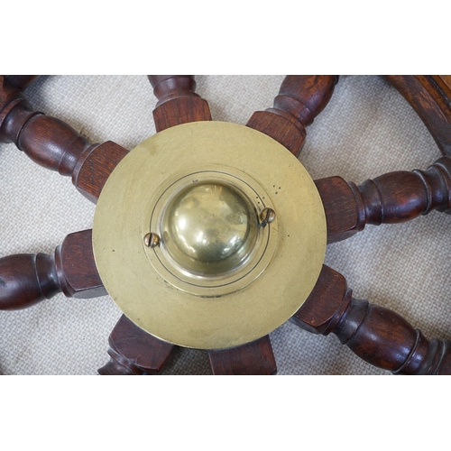 1586 - A 19th century mahogany and brass mounted ship's wheel 77cm