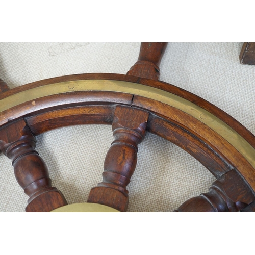 1586 - A 19th century mahogany and brass mounted ship's wheel 77cm