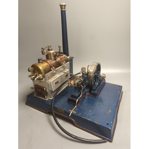 1397 - A Marklin spirit-fired live steam stationary engine with 10cm flywheel, 1920’s, and a smaller statio... 