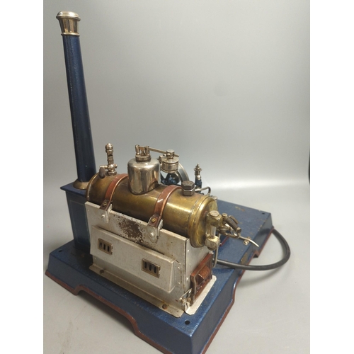 1397 - A Marklin spirit-fired live steam stationary engine with 10cm flywheel, 1920’s, and a smaller statio... 