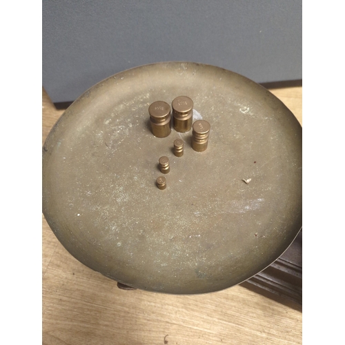 1557 - A large French cast iron and brass weighing scale,82 cms wide.