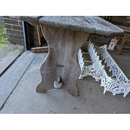 1001 - A rectangular weathered teak garden table, length 120cm, depth 62cm, height 65cm