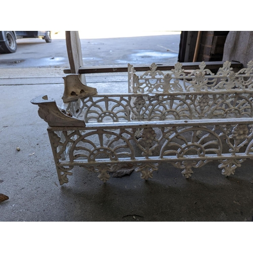 1003 - A pair of rectangular Victorian style painted metal garden planter frames (no bases), width 88cm, de... 