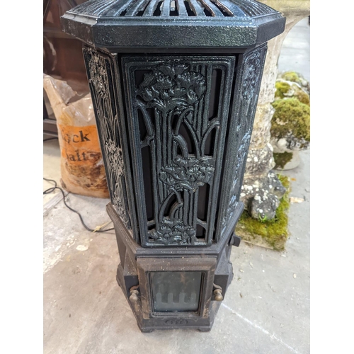 1012 - A Victorian style Esse Firemaster Solo hexagonal electric cast iron framed conservatory heater, heig... 