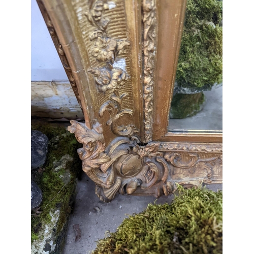 1014 - A late Victorian giltwood and gesso rectangular wall mirror, width 100cm, height 122cm