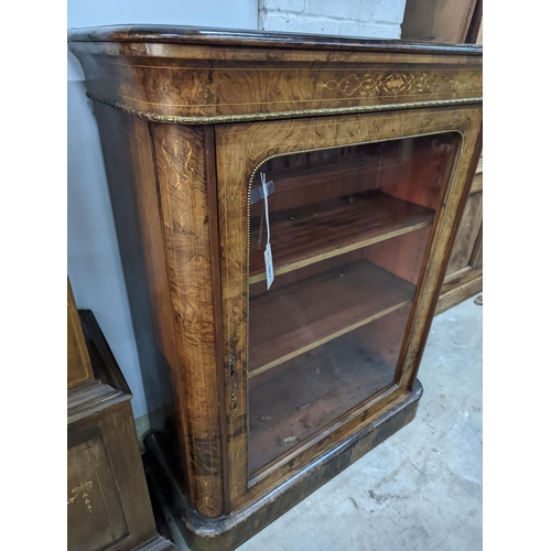 1017 - A Victorian inlaid gilt metal mounted figured walnut pier cabinet, width 84cm, depth 35cm, height 10... 