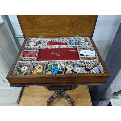 1021 - A Victorian walnut trumpet work table, the hinged top inset with a Tunbridge inlaid view of Eridge C... 