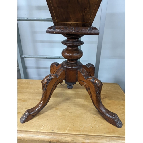 1021 - A Victorian walnut trumpet work table, the hinged top inset with a Tunbridge inlaid view of Eridge C... 