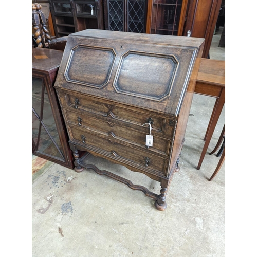 1048 - An early 20th century oak bureau, width 73cm, depth 41cm, height 99cm