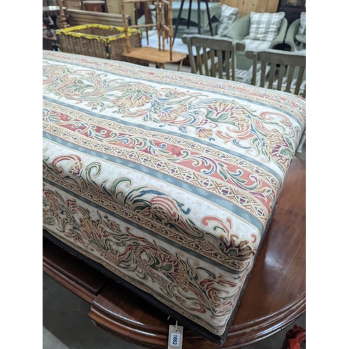 1052 - A late Victorian upholstered ottoman, length 121cm, depth 56cm, height 45cm