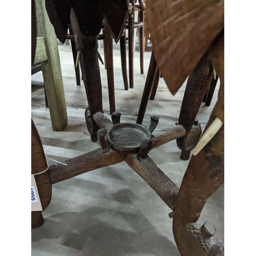 1055 - An Indian bone inlaid circular carved hardwood occasional table, diameter 52cm, height 59cm... 