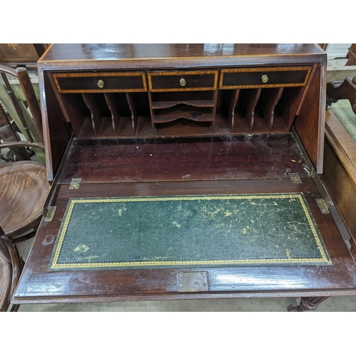 1063 - An Edwardian shell inlaid mahogany bureau, width 76cm, depth 44cm, height 97cm