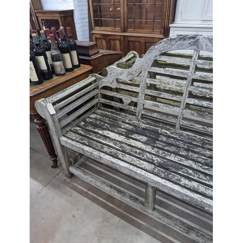 1068 - A pair of Lutyens design weathered teak garden benches, length 167cm, depth 58cm, height 104cm... 