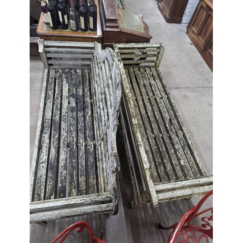 1068 - A pair of Lutyens design weathered teak garden benches, length 167cm, depth 58cm, height 104cm... 