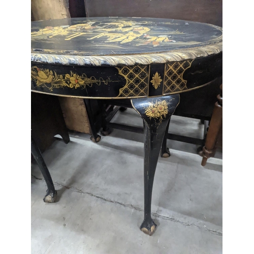 1075 - An early 20th century chinoiserie lacquer oval centre table, length 84cm, depth 59cm, height 77cm... 