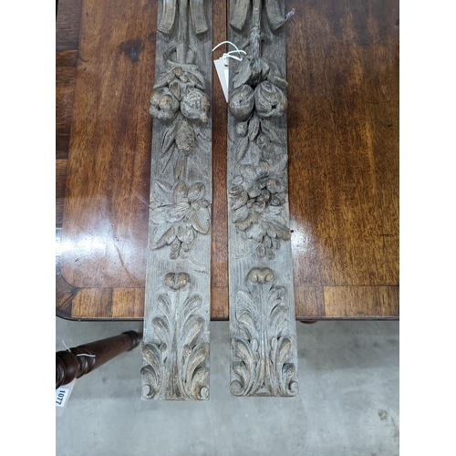 1078 - A pair of 19th century carved oak appliques, height 80cm