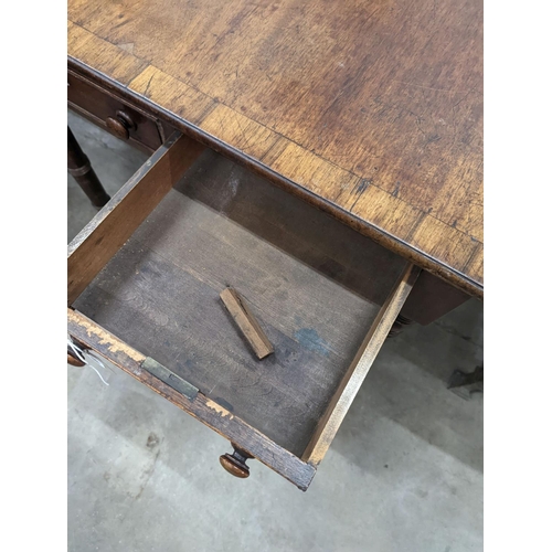 1080 - A Regency rosewood banded mahogany sofa table, 128cm extended, depth 75cm, height 73cm