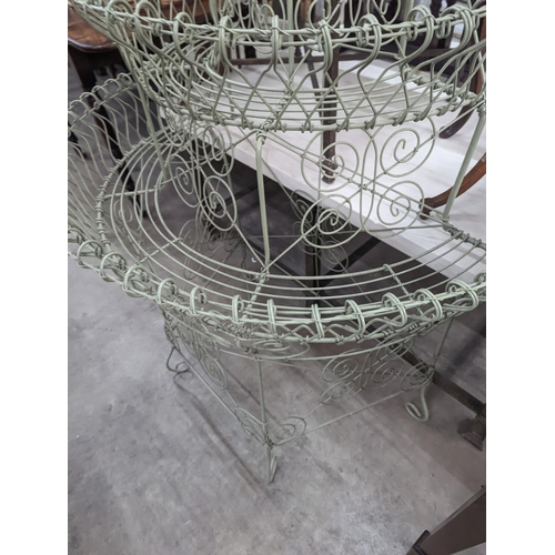 1083 - A Victorian style painted wirework plant stand, width 84cm, depth 54cm, height 130cm