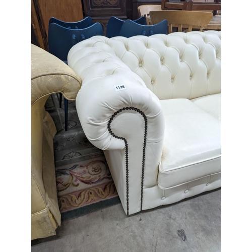 1085 - A Victorian style buttoned white leather Chesterfield settee, length 190cm, depth 86cm, height  72cm... 