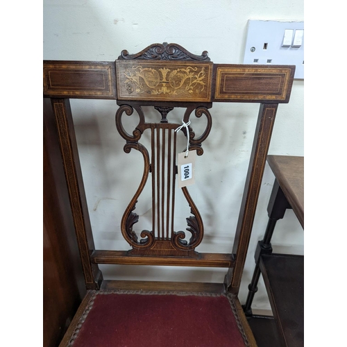 1088 - A pair of Edwardian inlaid mahogany lyre back chairs