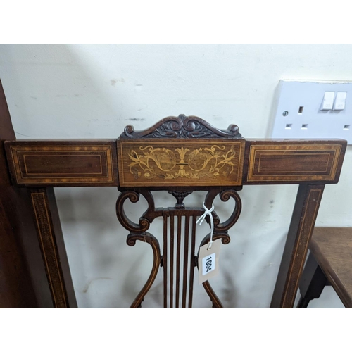 1088 - A pair of Edwardian inlaid mahogany lyre back chairs