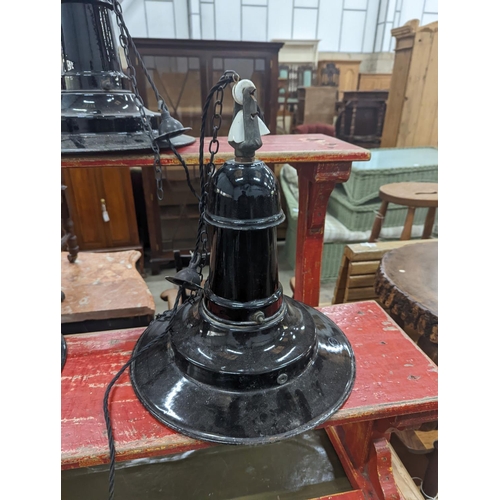 1091 - A set of three Continental black enamelled industrial style ceiling shades, height including fitting... 