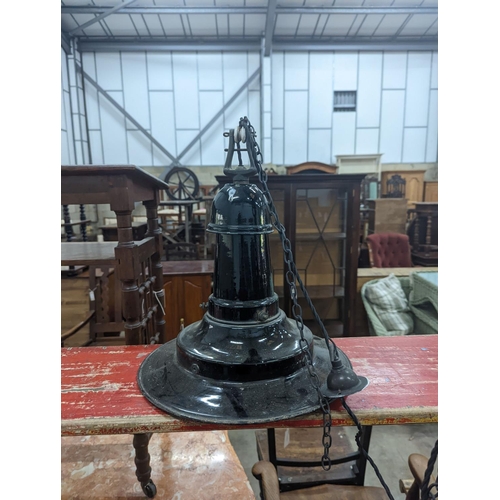 1091 - A set of three Continental black enamelled industrial style ceiling shades, height including fitting... 