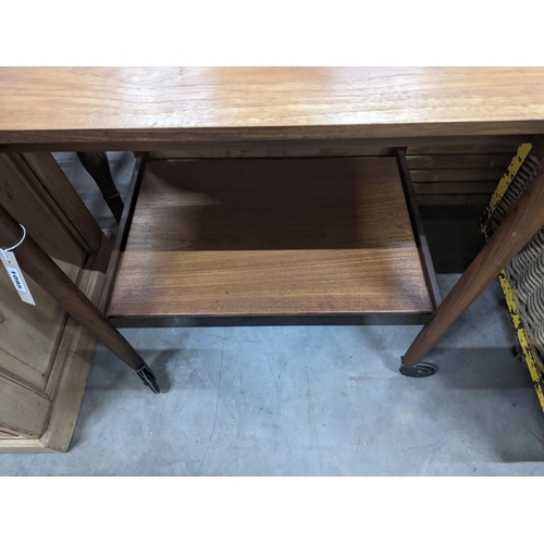 1095 - A mid century design teak two tier tea trolley, length 79cm, depth 46cm, height 70cm