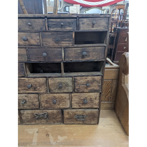 1104 - A 19th century fruitwood apothecary chest from the estate of Mary Wondrausch, containing rock sample... 