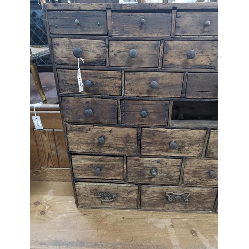 1104 - A 19th century fruitwood apothecary chest from the estate of Mary Wondrausch, containing rock sample... 