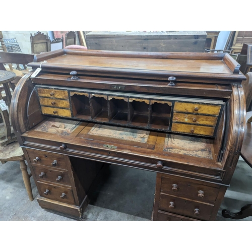 1119 - A Victorian walnut cylinder bureau, width 120cm, depth 62cm, height 110cm