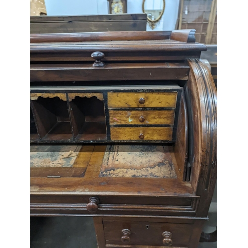 1119 - A Victorian walnut cylinder bureau, width 120cm, depth 62cm, height 110cm