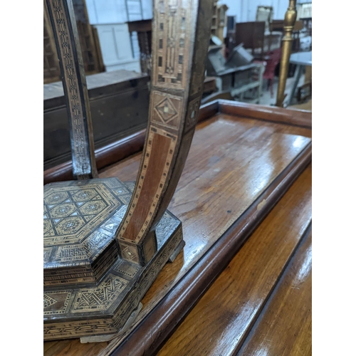 1120 - A Moorish bone and parquetry inlaid two tier occasional table, diameter 41cm, height 52cm... 