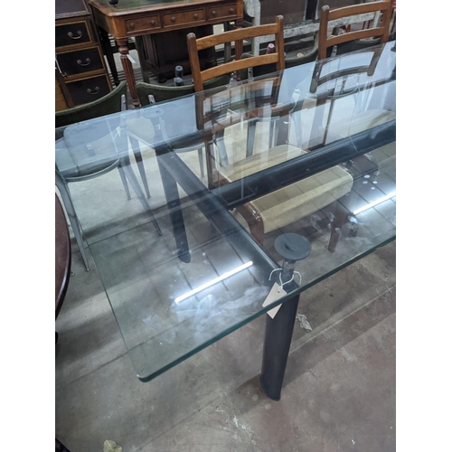 1124 - Mid century design.  An LC6 style rectangular glass top dining table, length 210 cms, width 85 cms, ... 